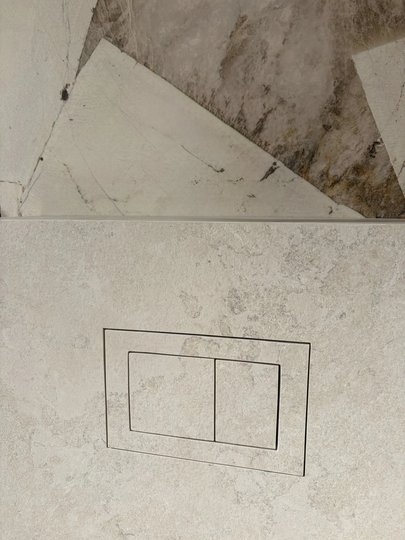 M1 hidden flush button installed in beige tile